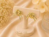 Aretes Nudo Dorado Amor